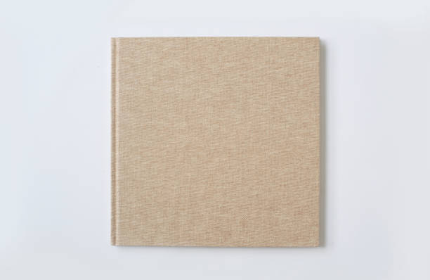 istock A large beige hardcover book 1206589115