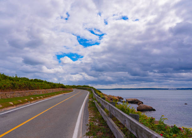 istock Empty seaside road disappearing into the distance 1206594853