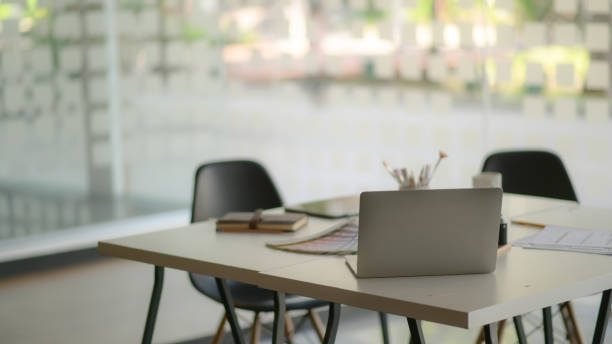 istock Modern contemporary workplace with laptop and office supplies. 1206594874