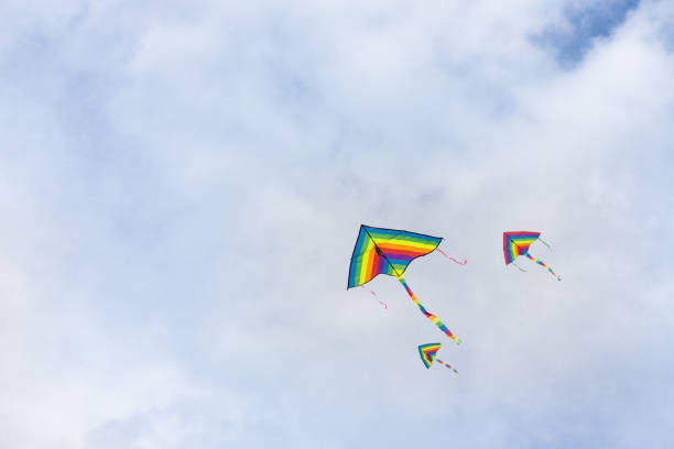 istock Coloful kites flying against blue sky with copy space 1206595469