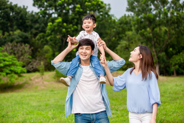 istock Young parents show the view to kid 1206597938