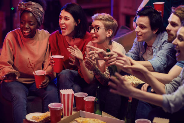 istock People supporting the football team 1206600584