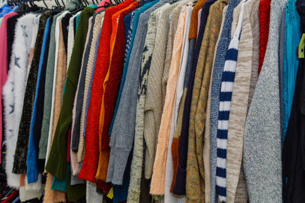 istock Beautiful clothes on hangers in a stylish store 1206602340