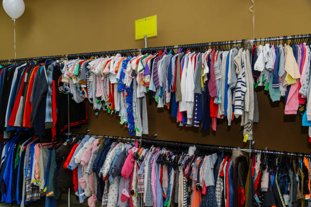 istock Shop interior with clothes hanging on a hanger 1206602506