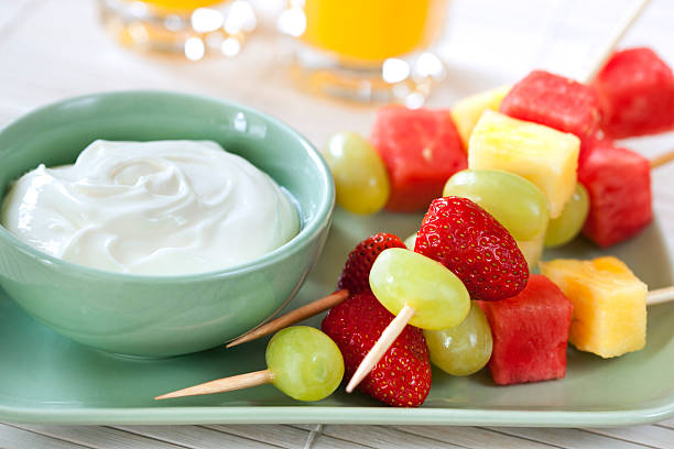 istock Fruit kebabs next to a bowl of yogurt 120660264