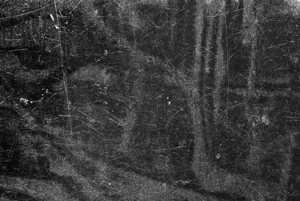 istock White scratches and dust on black background. Old dirty glass. 1206603639