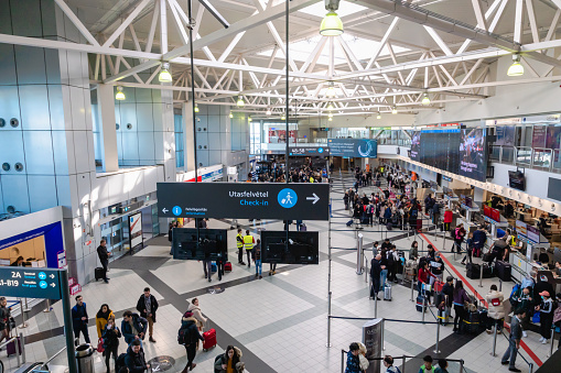 Budapest, Hungary - February 2020: Ferenc Liszt International Airport Budapest architecture and passengers around. Ferenc Liszt Airport in Budapest is the largest airport in Hungary.