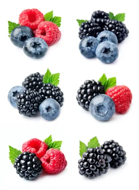 Set of sweeet berries of blueberries, raspberries and blackberries on white backgrounds.Collection of berry.
