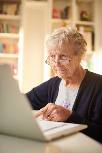 istock senior woman on her laptop 1206606598