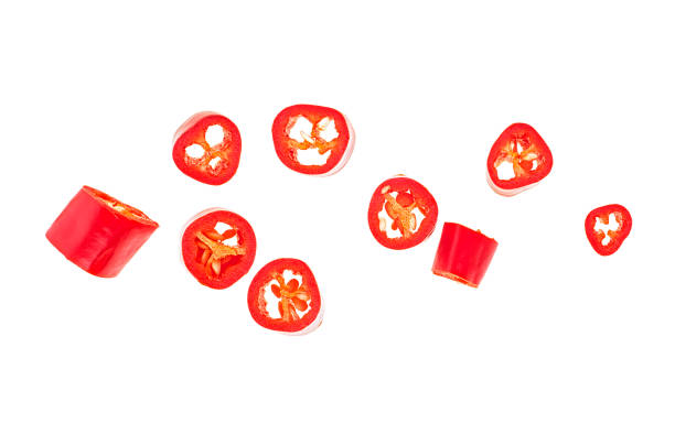 istock Red chopped chili peppers isolated on a white background, top view. 1206606621