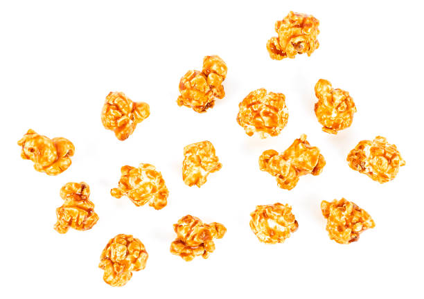 istock Caramel popcorn isolated on a white background, top view. 1206606635