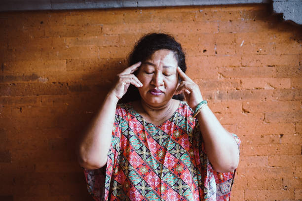 istock Southeast Asia Old Woman - Headache 1206606890