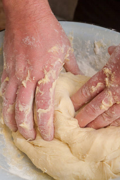 istock Cooking dough in a white plastic bowl at home 1206610477