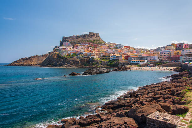 Village of Castelsardo View from the coast of the old village of Castelsardo in Sardinia castelsardo photos stock pictures, royalty-free photos & images