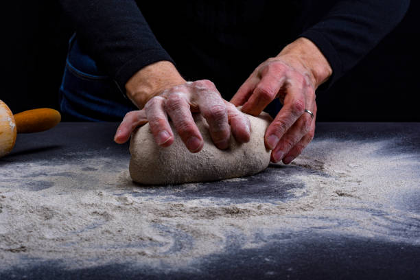istock Preparation of bread baking dough 1206613245