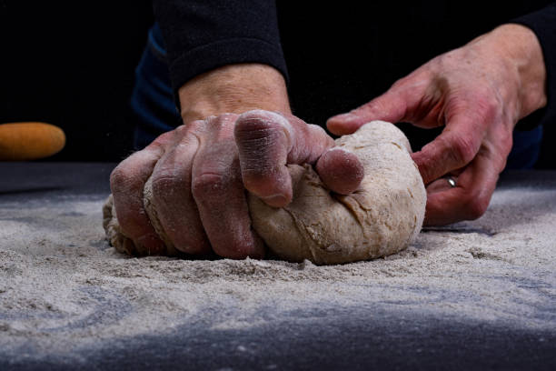 istock Preparation of bread baking dough 1206613252