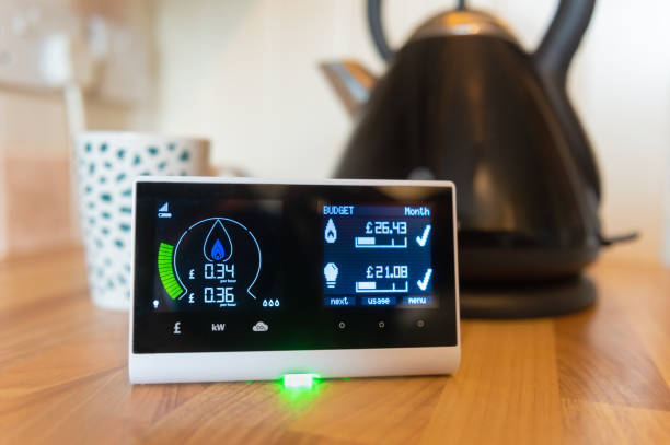 istock Smart Energy Monitor In Home Display, Smart Meter on kitchen work side 1206614765