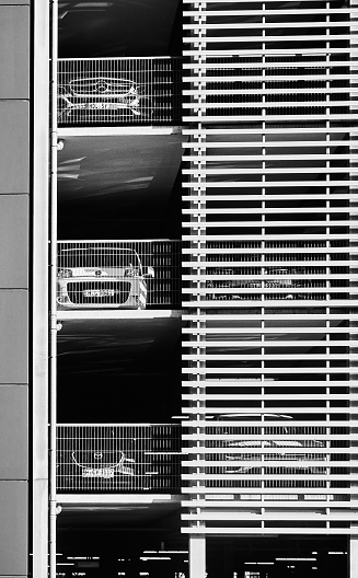 Hannover, Germany, February 9., 2020: Abstract black and white picture of the parking garage with cars at the airport