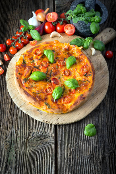 istock homemade pizza margherita with mozzarella, basil and tomatoes 1206618206