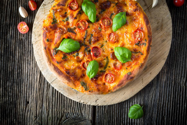 istock homemade pizza margherita with mozzarella, basil and tomatoes 1206618322