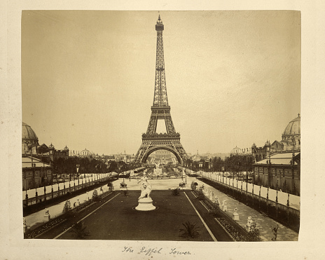 Antique photograph of Eiffel Tower a wrought-iron lattice tower on the Champ de Mars in Paris, France. It is named after the engineer Gustave Eiffel, whose company designed and built the tower. 19th Century