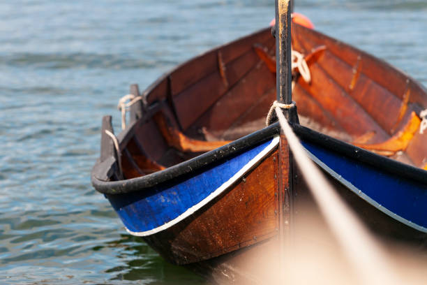 istock Moored wooden rowboat 1206618399