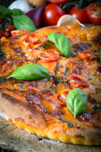 istock homemade pizza margherita with mozzarella, basil and tomatoes 1206618449