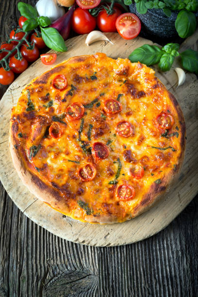 istock homemade pizza margherita with mozzarella, basil and tomatoes 1206619004