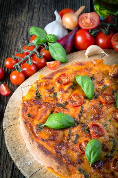 istock homemade pizza margherita with mozzarella, basil and tomatoes 1206619016
