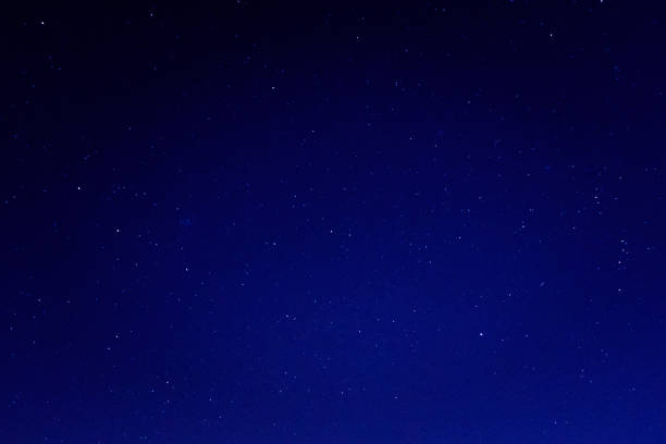 istock starry sky texture background. night sky with stars 1206625906