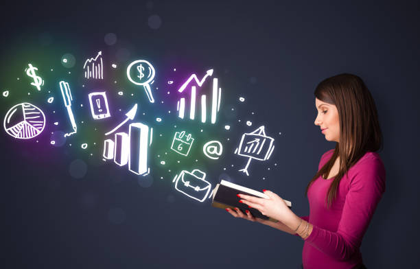 istock Young lady reading a book with business icons 1206627970