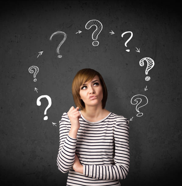 istock Young woman thinking with question mark circulation around her head 1206630185