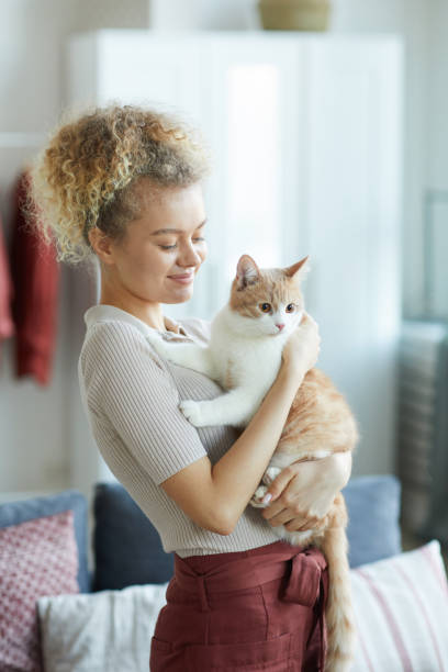 istock Woman loving her cat 1206638003
