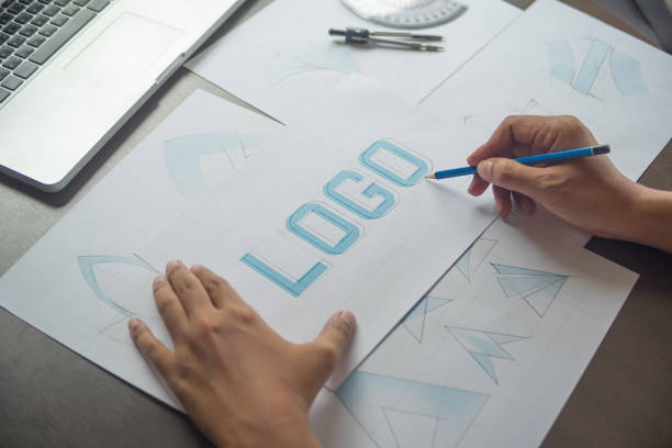 istock Graphic designer creative design sketch drawing logo Trademark brand Workspace 1206638545