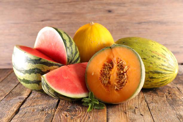 istock various of  melon and waterlon on wood background 1206638574