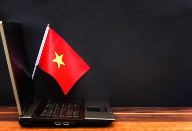 istock flag of Vietnam on laptop 1206641210