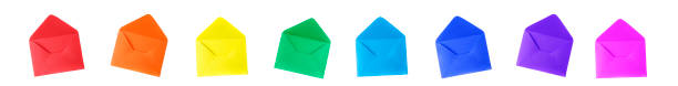 istock Multicolored isolated envelopes on a white background. Colors of rainbow. View from above. Banner. Copy space 1206647032