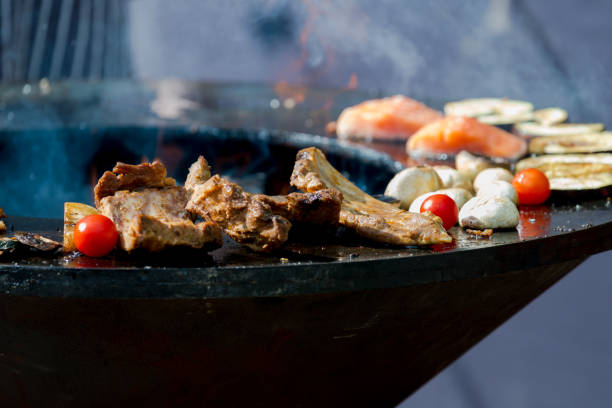 istock A grilled meat, fish and vegetables, close-up. Charcoal grill. Latvia 1206648309