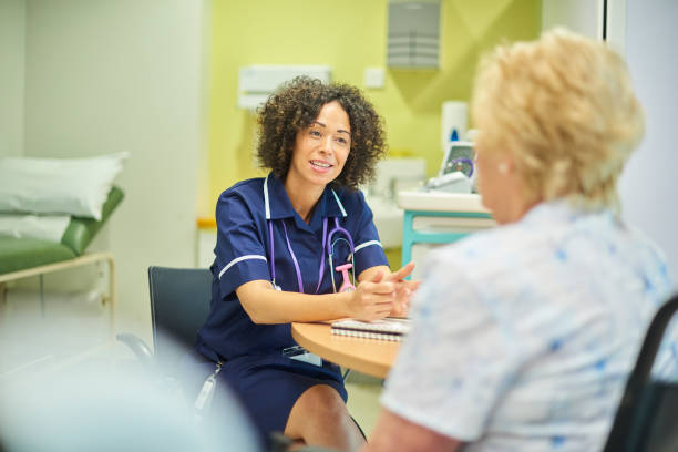 istock staff nurse with patient 1206655329