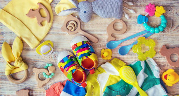 istock Baby clothes and accessories on a light background. Selective focus. 1206656920