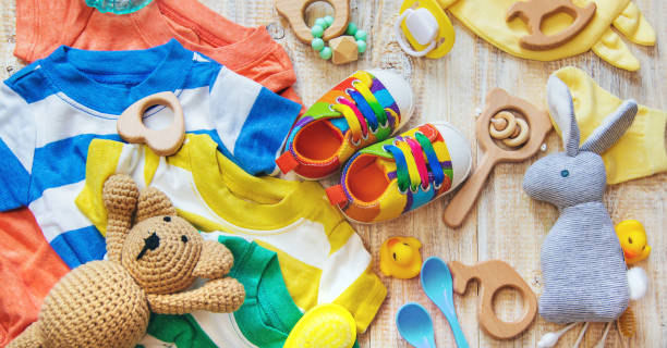 istock Baby clothes and accessories on a light background. Selective focus. 1206656931