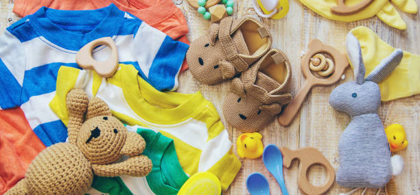 istock Baby clothes and accessories on a light background. Selective focus. 1206656937