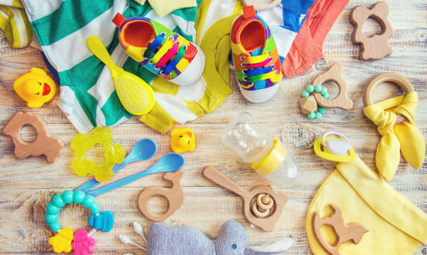 istock Baby clothes and accessories on a light background. Selective focus. 1206656956