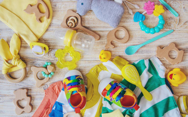 istock Baby clothes and accessories on a light background. Selective focus. 1206656967