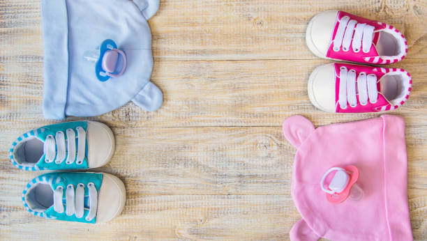istock Baby clothes and accessories on a light background. Selective focus. 1206656987
