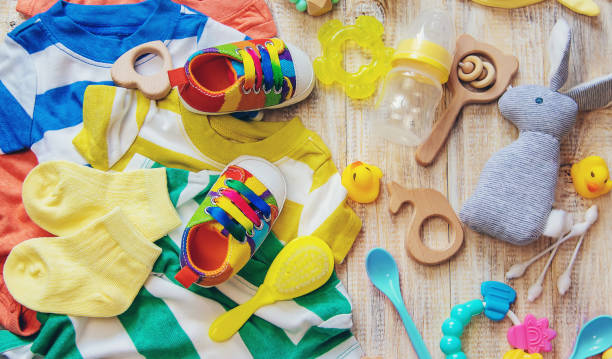 istock Baby clothes and accessories on a light background. Selective focus. 1206657018