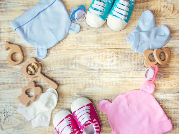 istock Baby clothes and accessories on a light background. Selective focus. 1206657037