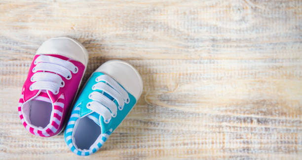 istock Baby booties and accessories on a light background. Selective focus. nature. 1206657088