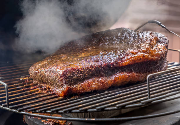 Fresh smoked Texas bbq brisket on the grill stock photo
