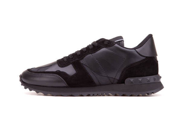 istock Sneakers side view. Smooth and suede leather sneakers. 1206660395